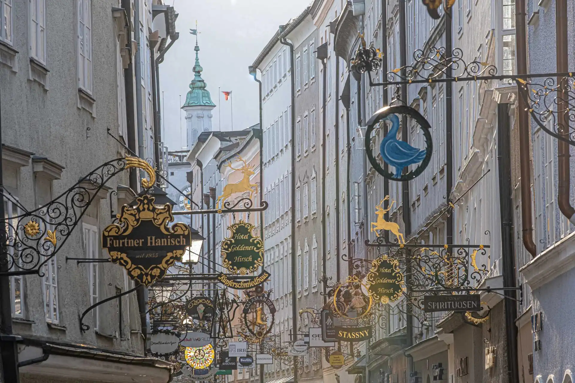 Wrought iron guild signs above Getreidegasse