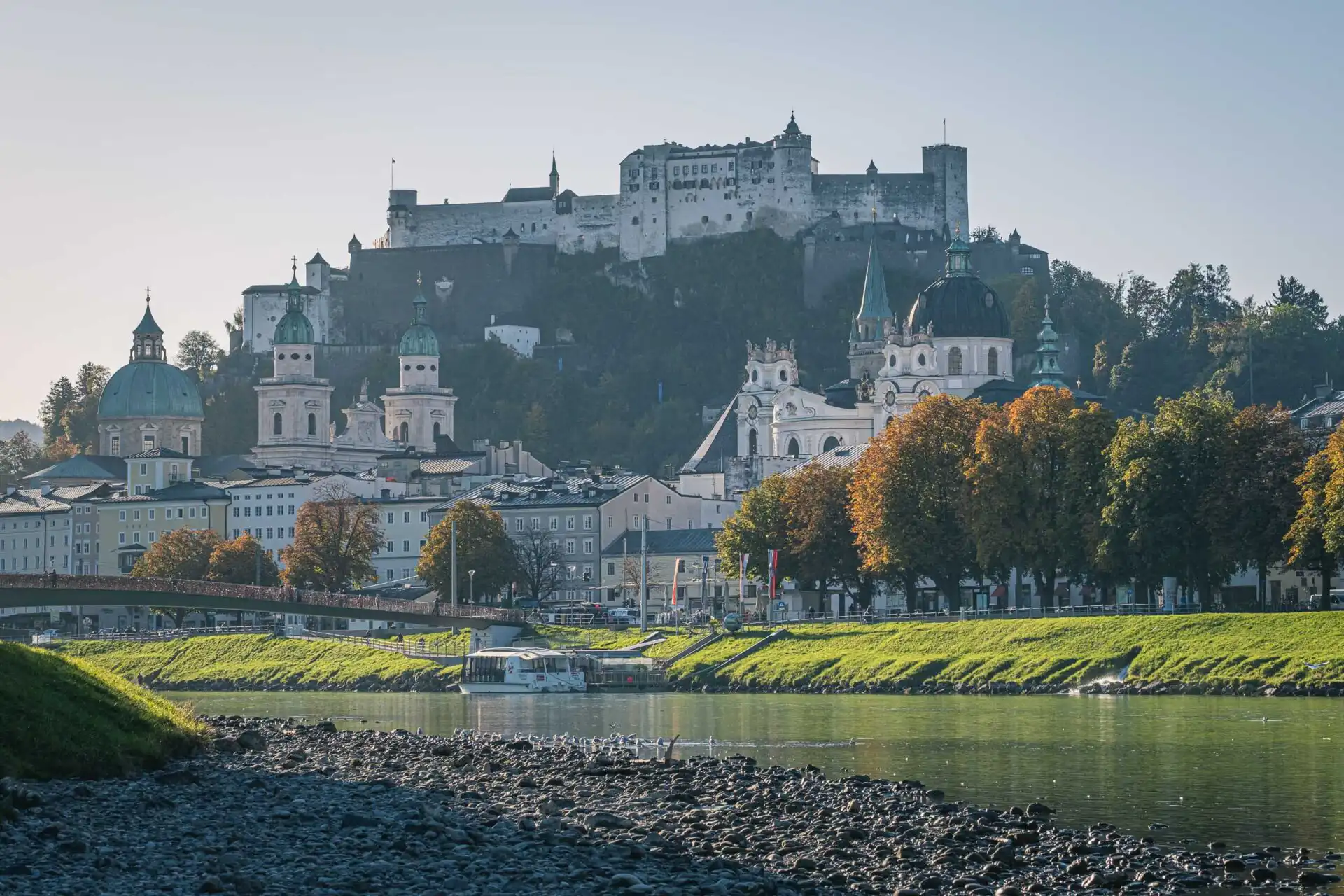 The Salzach river curving past the old town and Hohensalzburg fortress in Salzburg