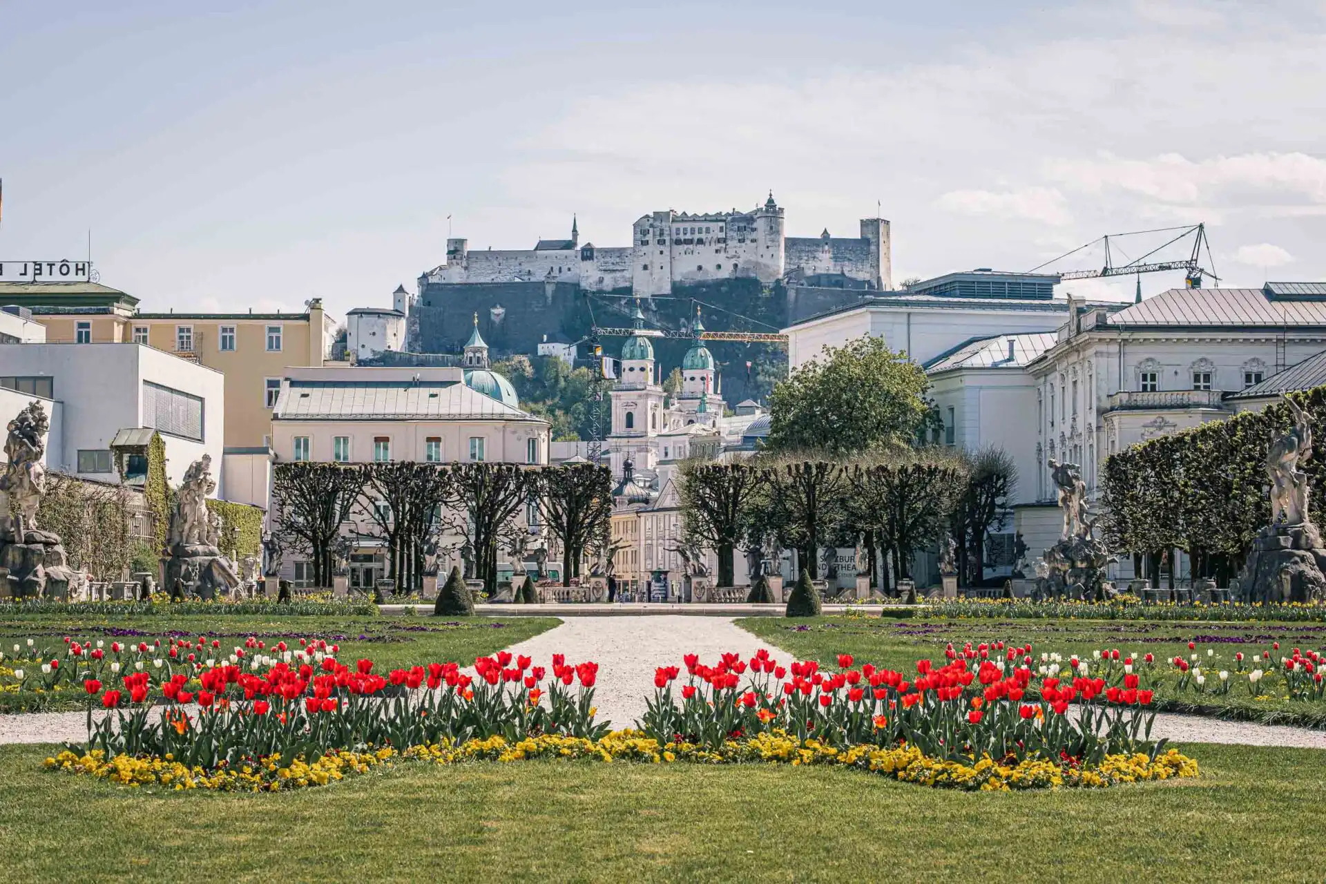 Tulip beds in Mirabell Gardens with the fortress behind