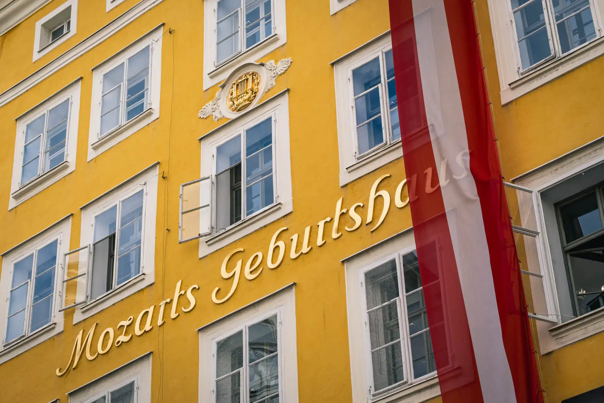 Yellow facade of Mozart's Birthplace on Getreidegasse